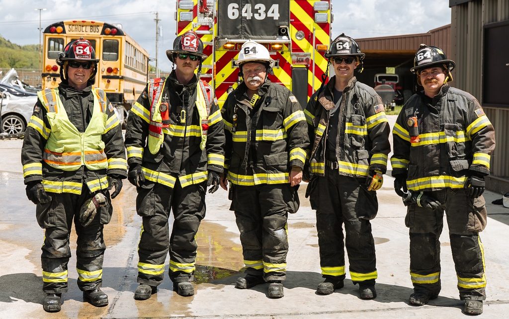 Group of firefighters standing in gear